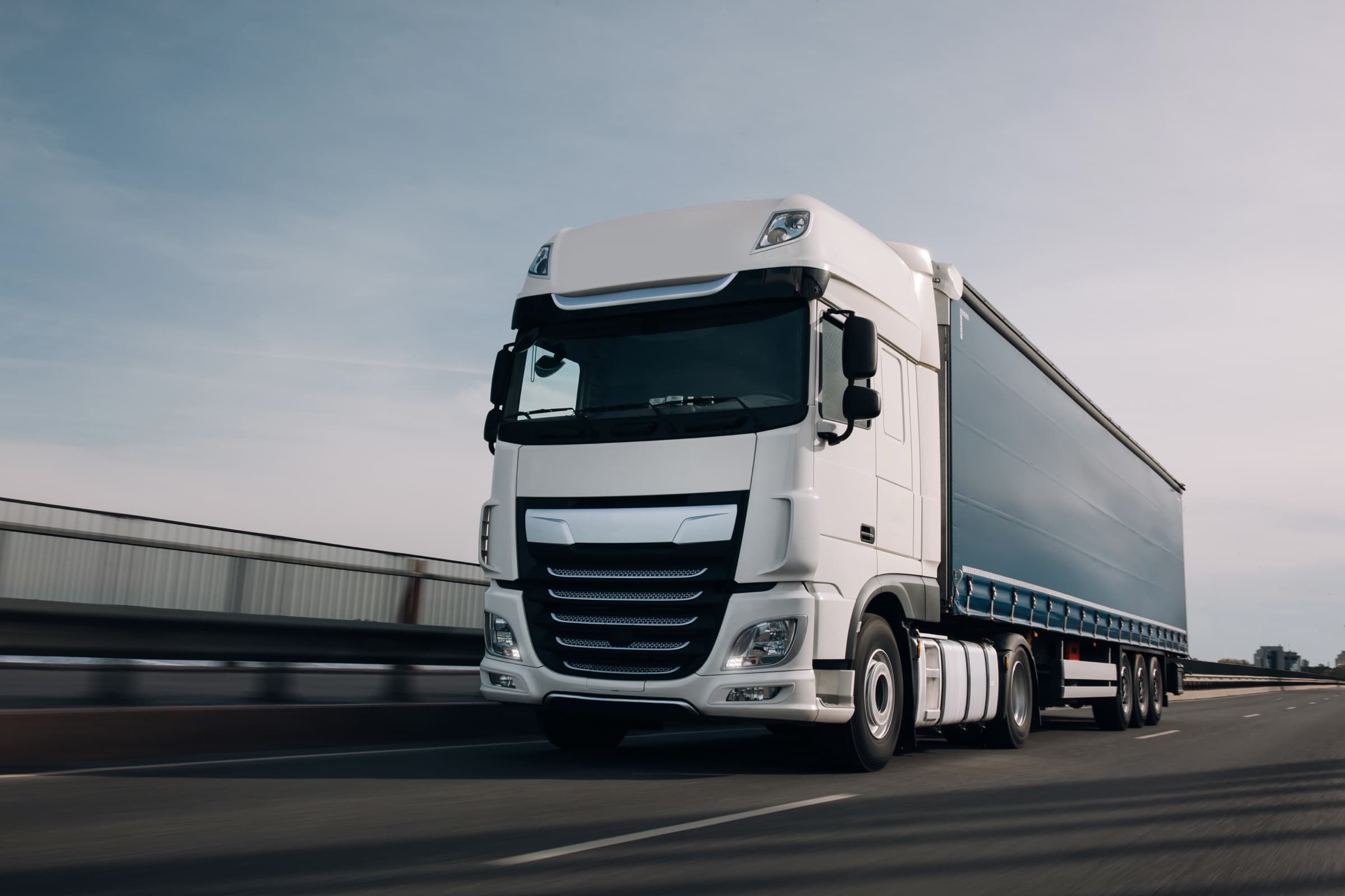 A truck and trailer on the open road